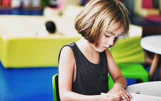 kid at desk